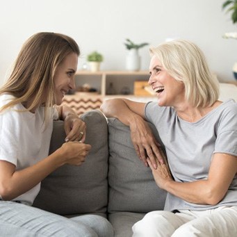 Ladies converse on couch
