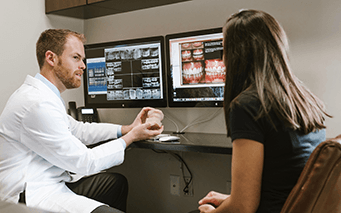 Dr. Tubo during a consultation with a patient