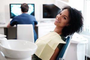 Woman smiling after the veneer process