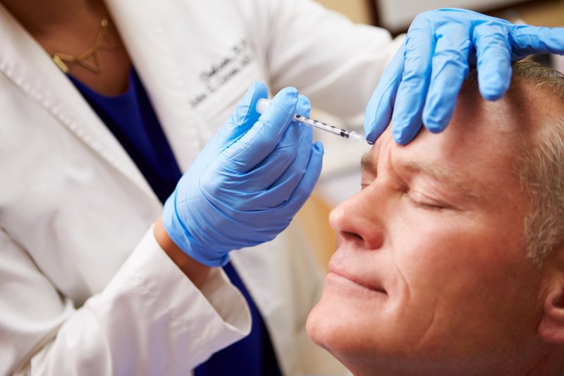 Man getting BOTOX treatment