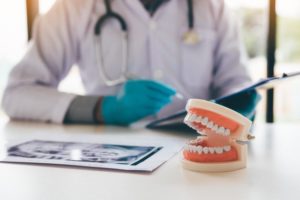 a model of dentures in Whitinsville